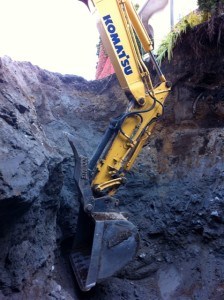 Excavator Removes Oil Tank From Large Hole in Coquitlam